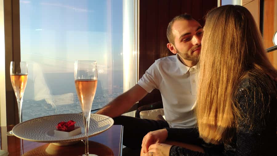 Dubai: Burj Khalifa Sunset Engagement with Porsche Pickup - Dinner on a private terrace with dancing fountains