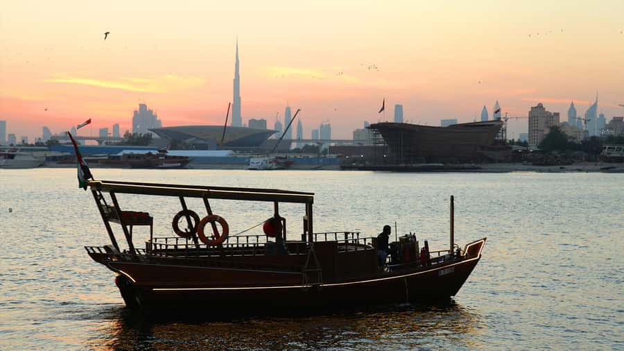 Dubai: Burj Khalifa Sunset on an Abra - What you’ll see on the canal: birds, dhow yards, and the real Dubai edges
