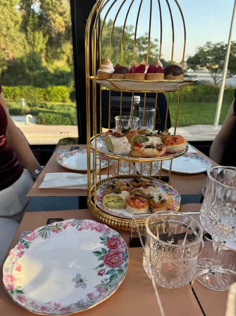 Dubai: Bustronomy Panoramic Afternoon Tea City Tour - The afternoon tea meal, from savory bites to dessert classics