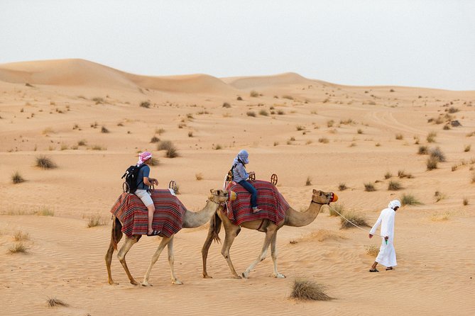 Dubai Camel Desert Safari, Traditional Meal & Heritage Activities - The camel caravan experience, 45 minutes that feel like travel