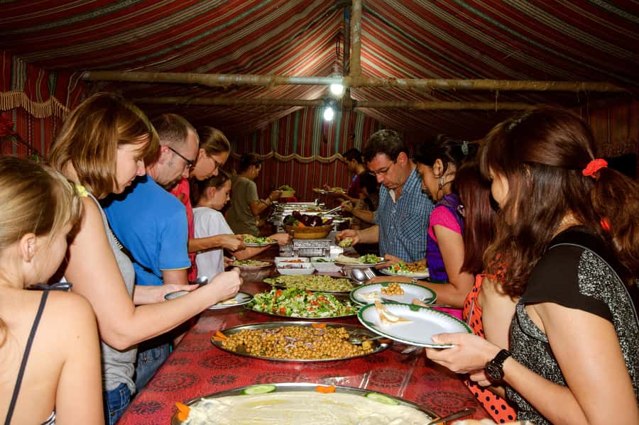 Dubai Cityscape and Desert Safari Full-Day Tour - Barbecue dinner and fire dance under the stars