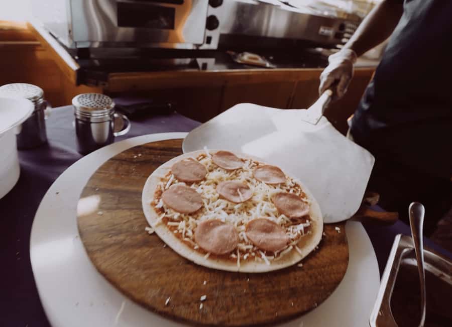 Dubai Creek Dhow Cruise with Unlimited Freshly Baked Pizza - A 1-hour dhow-and-pizza plan that feels like two trips