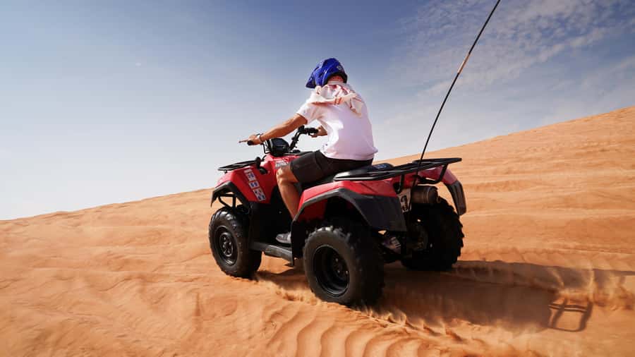 Dubai Desert Adventure: Red Dunes Guided Quad/Polaris & BBQ - Hotel pickup, ride options, and what the safety briefing really covers