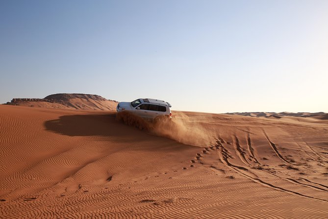 Dubai Desert Discovery: Red Dunes Safari, Sandboard & Camel Ride - 45 to 50 minutes of dune bashing in a 4WD