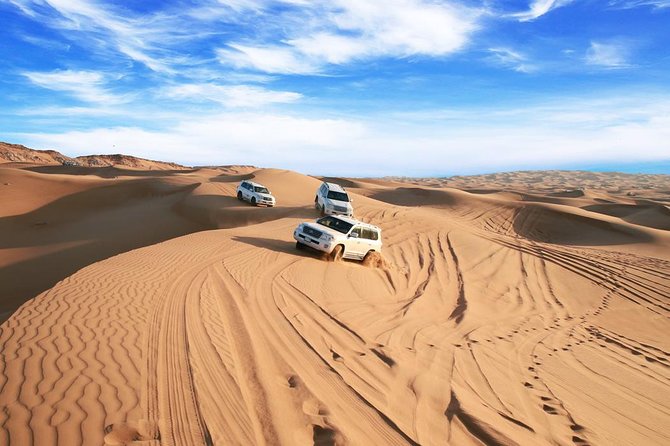 Dubai Desert Journey: Red Dunes Safari with BBQ in Bedouin Camp - Bedouin camp welcome: Gahwa, dates, Luqaimat, shisha, henna