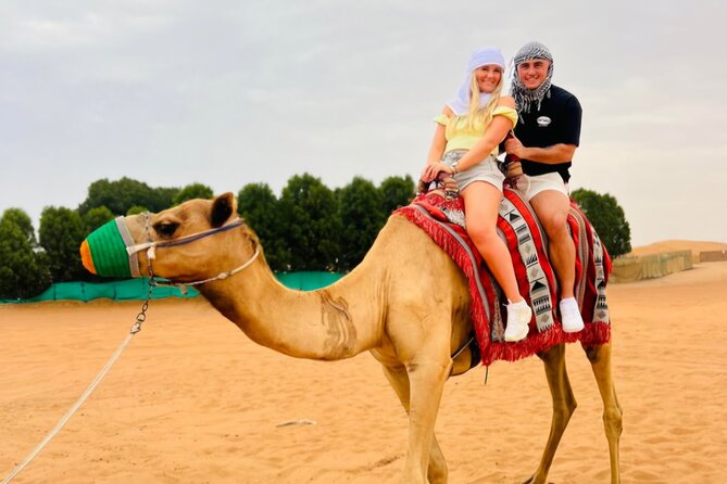 Dubai Desert Safari 20 mins Dune Bashing BBQ Live Show Camel Ride - What is included vs extra: quad biking and VIP add-ons