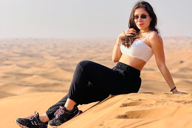 Dubai Desert Safari, BBQ, Live Shows, Camel, Sandboard (7-Hours) - Bedouin camp time: Arabic coffee, henna, falcon photos, and shisha