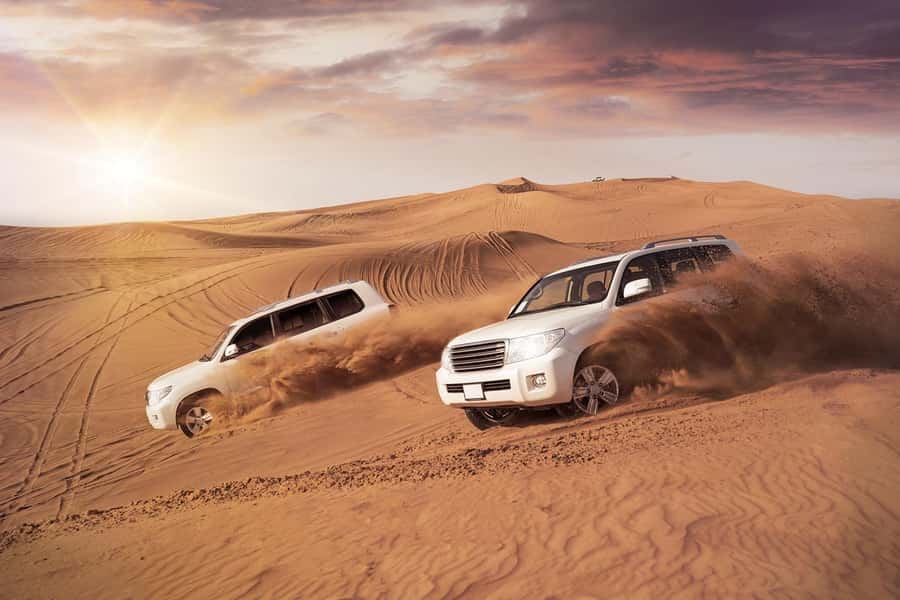Dubai: Desert Safari, Camel Ride, and BBQ Dinner - Watching Sunset Over the Dunes