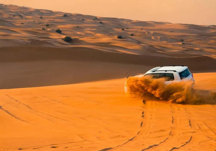 Dubai: Desert Safari, Camel Ride, Sandboard & Buffet Dinner - Luxury 4x4 Desert Drive and Dune Bashing: The Real Workout