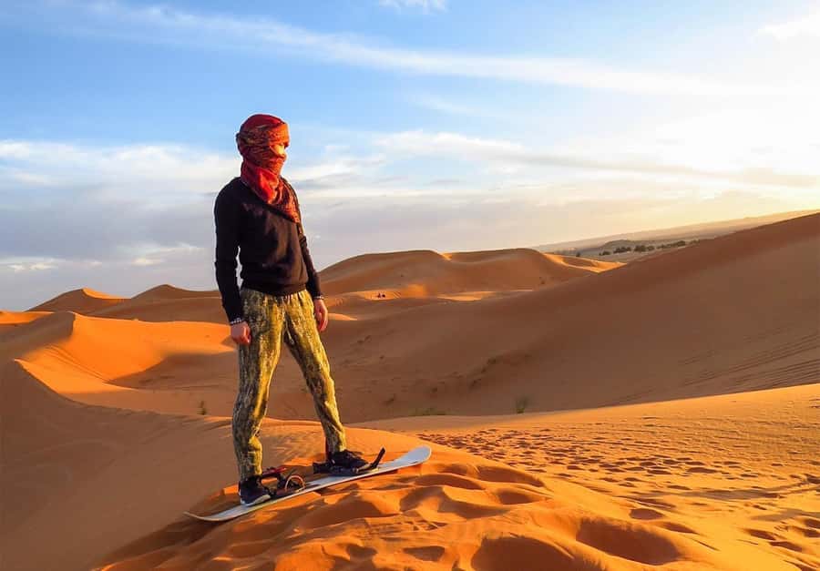 Dubai: Desert Safari, Camel Ride, Sandboard & Buffet Dinner - Henna Painting, Arabic Coffee, and the Camp Atmosphere