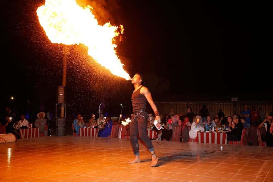 Dubai: Desert Safari, Camel Ride, Sandboard & Buffet Dinner - Live Entertainment in the Desert: Belly Dance, Tanoura, Fireshow