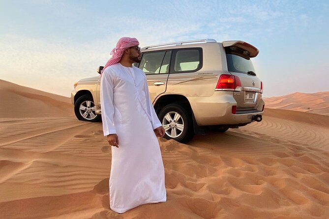 Dubai Desert Safari, Camel Ride, Shisha, Henna, Live BBQ & Shows - Al Madam Thrills: Quad Option, Dune Bashing, and Sandboarding Stops