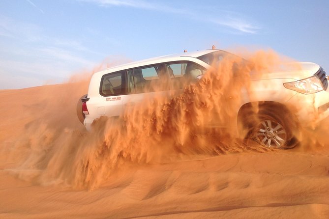 Dubai: Desert Safari, Camel Ride, Show & Optional Dinner - Desert camp time: henna, shisha-style smoking, and falcon photos