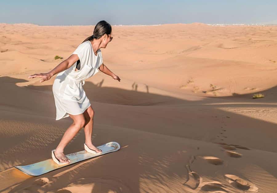 Dubai: Desert Safari Camel Riding, Sandboarding & BBQ Dinner - First Stop: Hotel Pickup, Tyre Pressure, and Falcon Moments