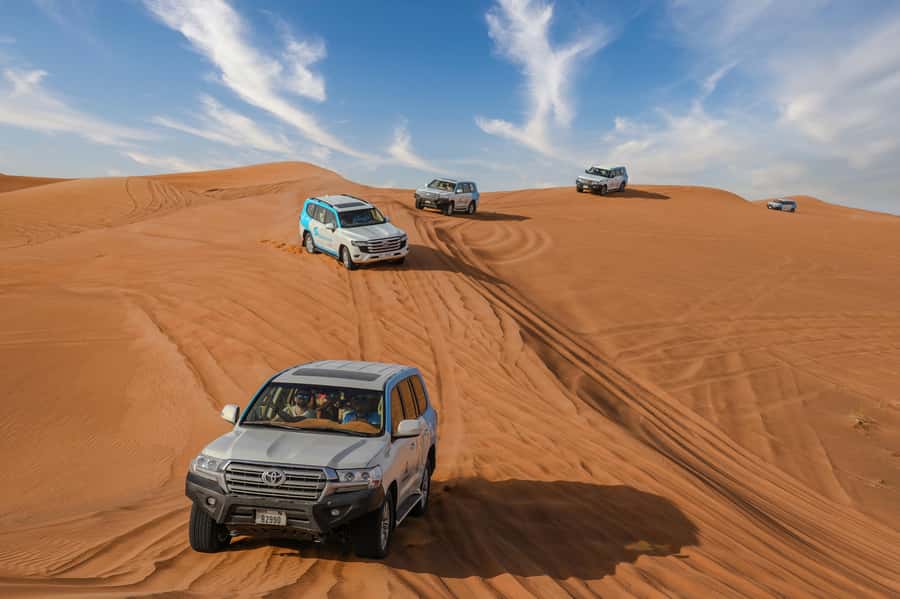 Dubai: Desert Safari, Quad Bike, Camel Ride & Al Khayma Camp - Quad biking in Lahbab desert, adrenaline with real responsibility