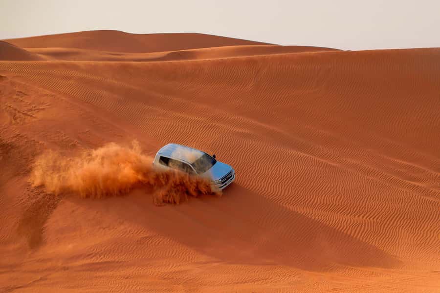 Dubai: Desert Safari, Quad Bike, Sandboarding, Camels & BBQ - Key highlights at a glance