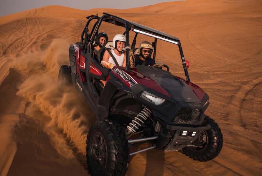 Dubai: Desert Safari, Quad Bike, Sandboarding, Camels & BBQ - Where the Lehbab Red Dunes safari begins: pickup and the desert handoff