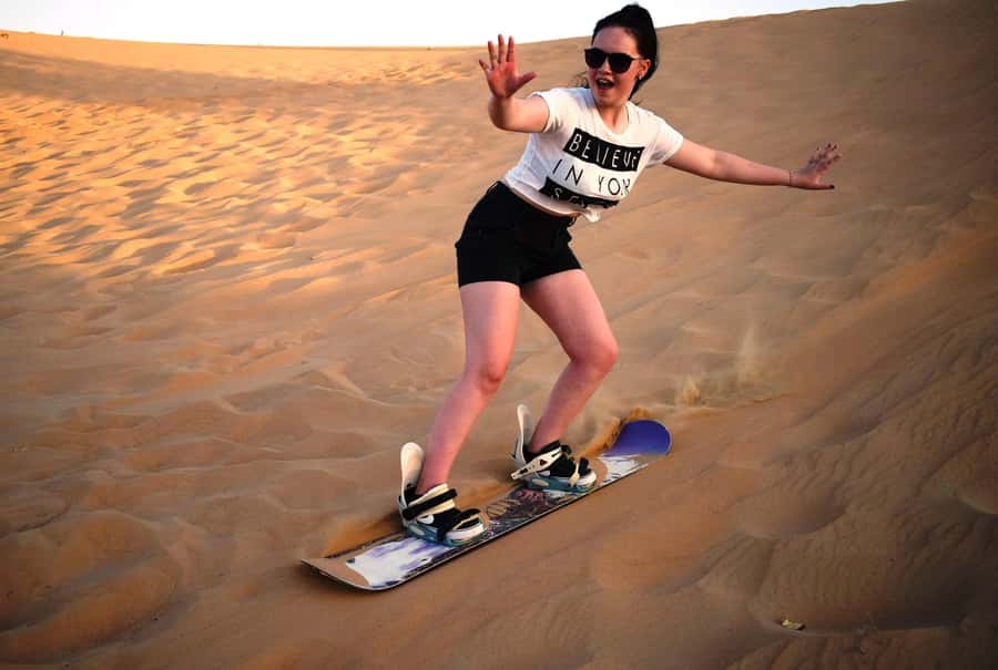 Dubai Desert Safari, Quad Biking, Camel Ride, & Sandboarding - Sunset, Gahwa, and the camp routine before the shows