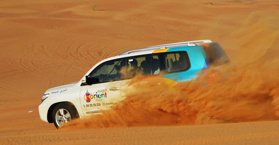 Dubai Desert Safari, Quad Biking, Camel Ride, & Sandboarding - Pickup in a shared Land Cruiser, and why timing matters