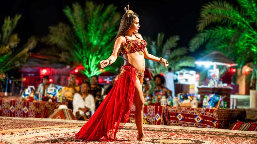 Dubai Desert Safari - Sandboarding, Quad Bike & BBQ Options - Camel Ride and Sunset Photo Stop: The Calm Between Thrills