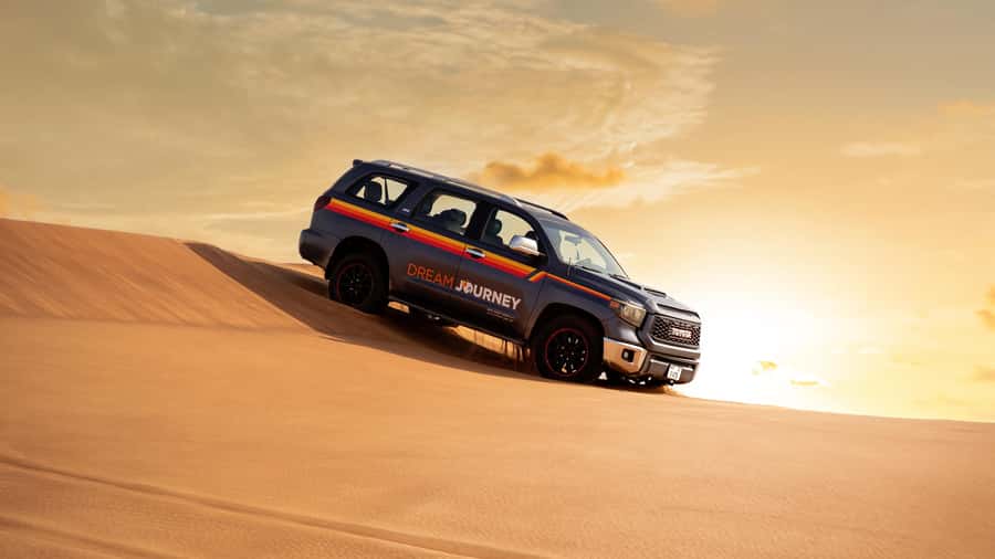 Dubai Desert Safari - Sandboarding, Quad Bike & BBQ Options - Hotel Pickup and the 50-Minute Drive to Lahbab