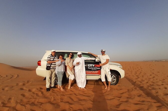 Dubai Desert Safari: Tanoura Show, Dune Bashing and BBQ Dinner - Dress-up photos and henna painting, optional but memorable