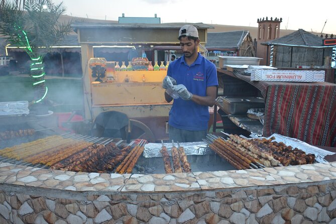 Dubai Desert safari Tour with Live BBQ & Belly Dance Shows - Al Aweer Camp: Camel Rides, Henna, Shisha, and Live Shows