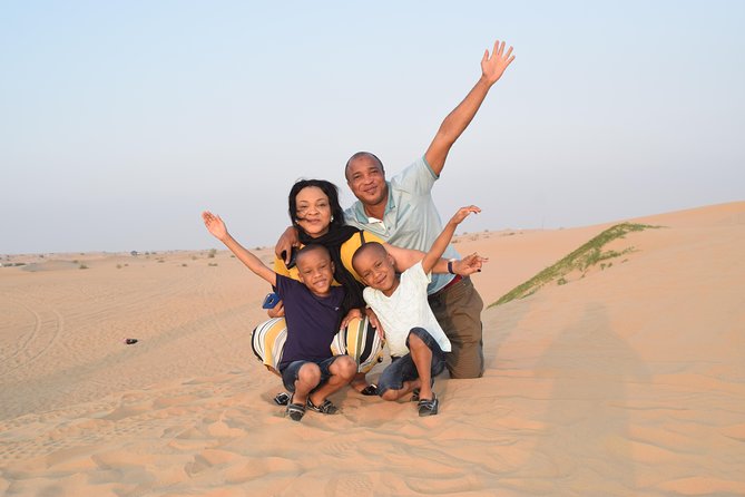 Dubai Desert Safari with BBQ, 3 Shows & Camel Ride at Majlis Camp - Sandboarding and ATV upgrade: what’s included and what costs more
