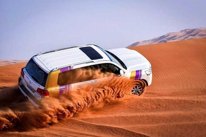 Dubai Desert Safari with BBQ And 4W Land Cruiser Dune Bashing Experience - Key takeaways