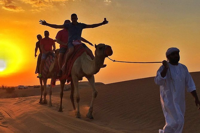 Dubai Desert Safari with BBQ And 4W Land Cruiser Dune Bashing Experience - Henna, Traditional Dress Photos, and the Sunset View That Makes It Worth It