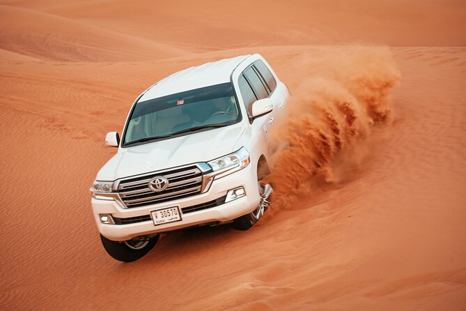 Dubai Desert Safari with BBQ Dinner and Live Shows - Bedouin safari camp: camel ride, welcome drinks, henna, and BBQ