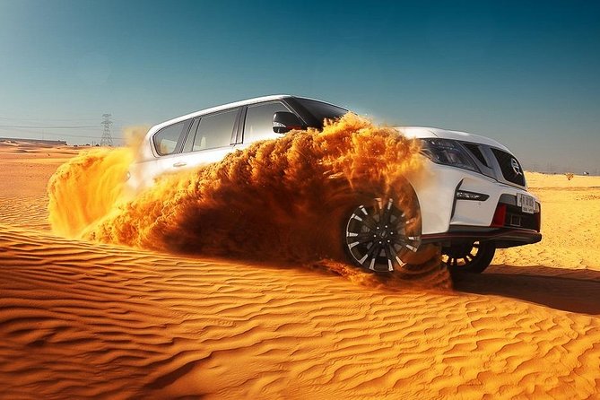 Dubai Desert Safari With BBQ, Quad Bike And Camel Ride - Camp welcome: henna, Arabic dress photos, and falcon moments