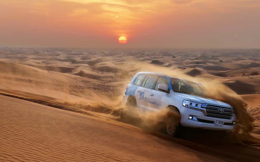 Dubai: Desert Safari with Camp, Dinner, & Optional Overnight - Camp welcome: mocktail, ghutra photos, Arabic coffee, and luqaimat