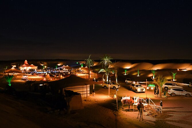 Dubai Desert Safari with Desert Camp Dinner, Camel Ride & Shows - The Shows Under Desert Stars: Belly Dancing, Tanoura, and Fire