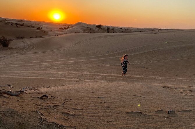 Dubai Desert Safari With Dune Bashing, Camel Ride & BBQ Dinner - Sandboarding at the camp: included, straightforward, and actually fun