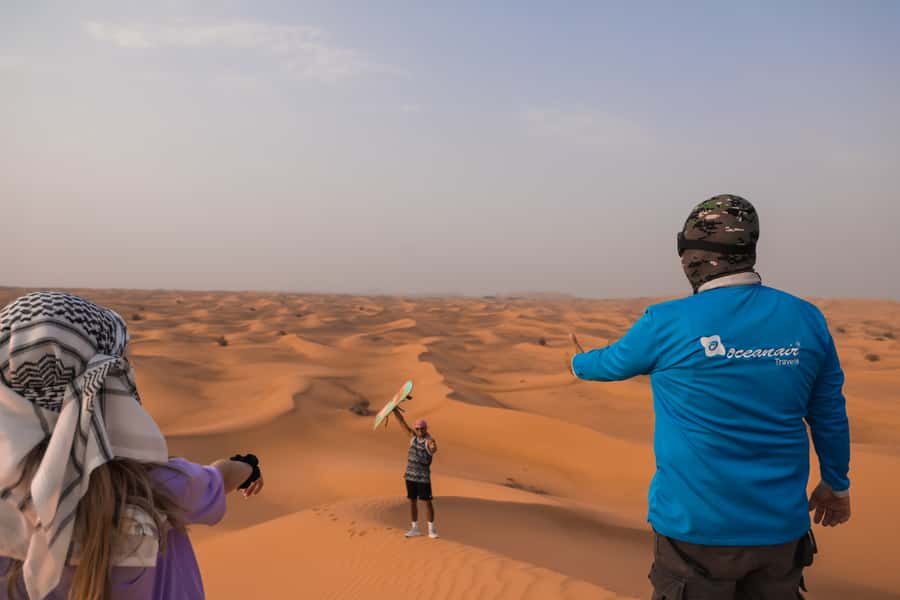 Dubai: Dune Buggy Desert Safari, Camel Ride & Sandboarding - Sandboarding on Slopes: The Part That’s All Legs and Balance