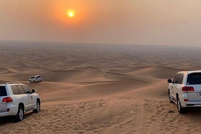 Dubai Dunes Safari With Quad Bike, Camel Ride, BBQ Dinner & Live Shows - Sandboarding and henna painting: small add-ons, big fun