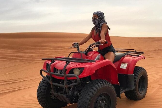 Dubai Dunes Safari With Quad Bike, Camel Ride, BBQ Dinner & Live Shows - The dinner show: BBQ buffet with belly dance, Tanura, and fire