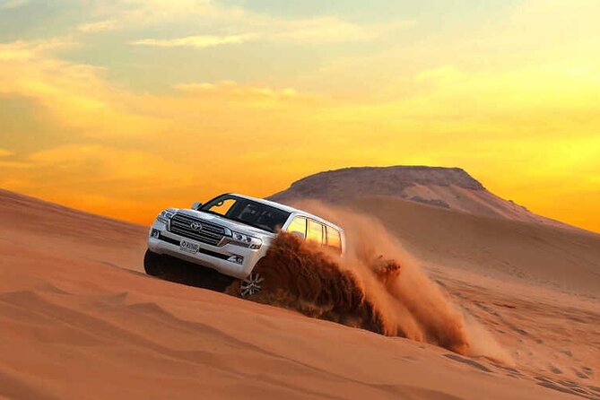 Dubai Evening Desert Safari & BBQ Dinner - Live entertainment: belly dance, Tanura, and fire