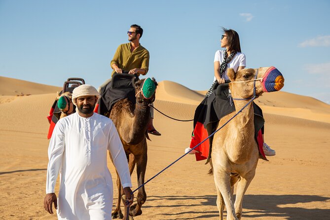 Dubai Evening Desert Safari: Sandboarding, BBQ, Camel Ride & more - Camel Ride, Sandboarding, and Henna: Doing It, Not Just Watching