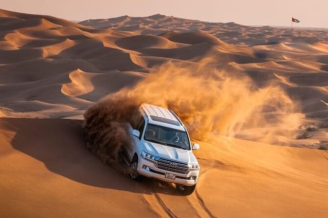 Dubai Evening Desert Safari with BBQ & Live Entertainment - Lahbab Red Desert Start: Dune Bashing and Sunset Photos