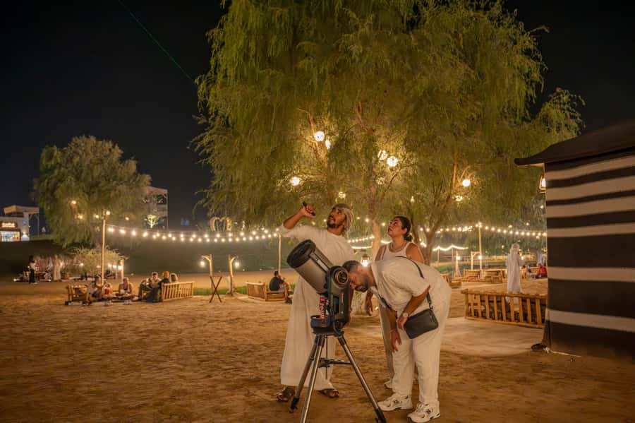 Dubai: Evening Desert Safari with Camel Ride & Stargazing - Photo stops and wildlife viewing before the camp
