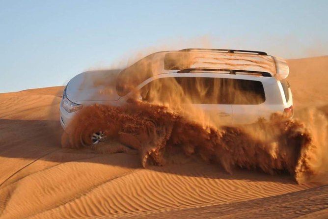 Dubai Evening Private 4x4 Desert Safari ,4 Live Shows, BBQ Dinner - Camel ride, henna, shisha, and costume photos at the camp