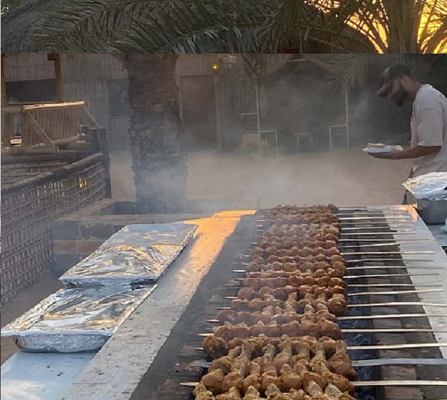 Dubai: Evening Tour with Quad Biking, Camel Ride, and BBQ - The Desert Camp Welcome: Dates, Arabic Coffee, Henna, and Dress-Up