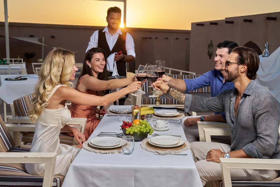 Dubai: Exclusive VIP Desert Safari Dinner with Live Show - The red-dune ramp up: dune bashing, sandboarding, and sunset photos