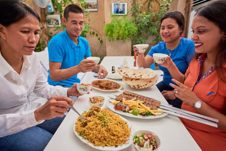 Dubai: Flavors of Arabia Souk Tour with Tastings & Dinner - Dubai Creek Abra Ride, Tea and Dates With Real Water Views