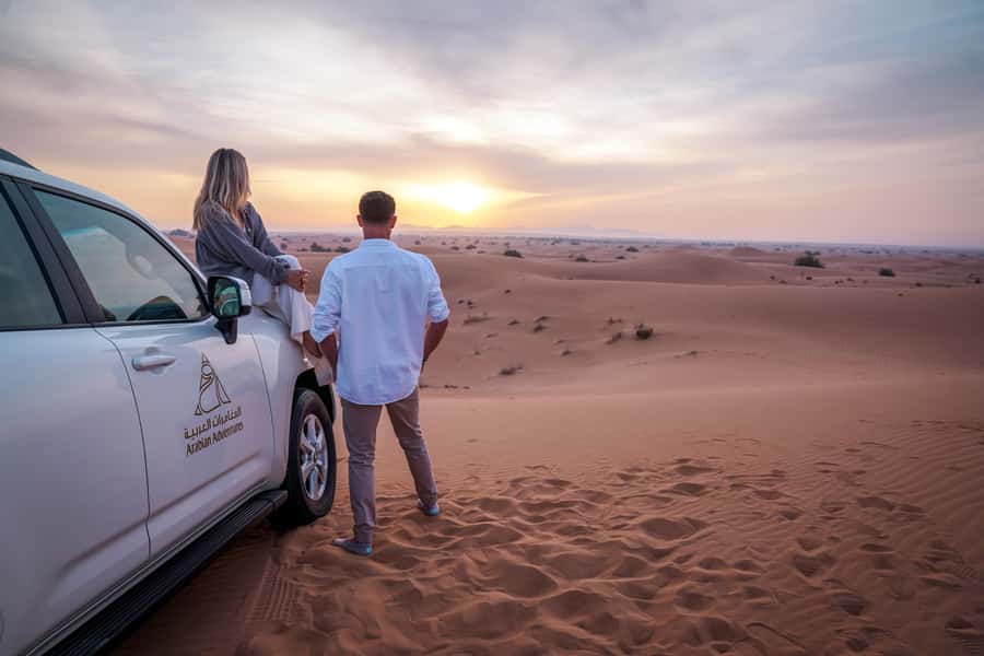 Dubai Fort Lisaili Desert: Quad, Buggy Ride & Free Souvenir - Sunset dunes, camel ride, henna, archery, and the falcon show