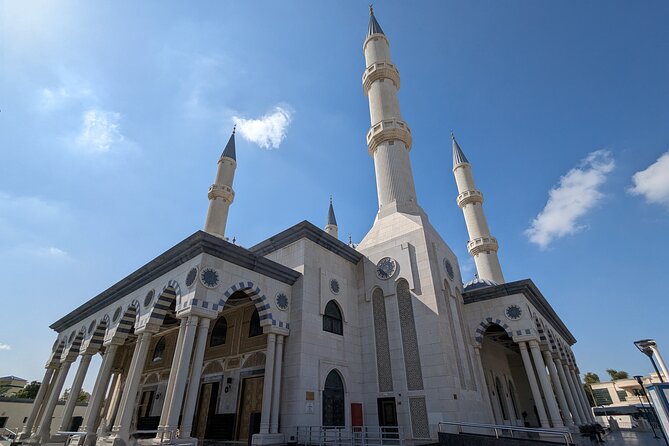 Dubai: Frame Tickets, Creek, Souks & Blue Mosque Guided Tour - Al Fahidi District and the heritage house visit