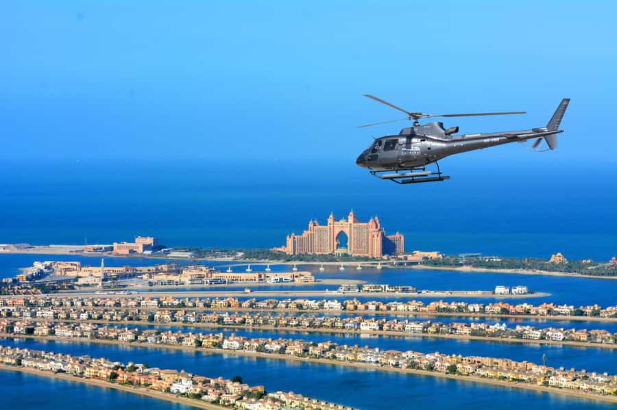 Dubai: Helicopter Ride, Desert Safari, Camels & Refreshments - Quad Biking Over Red Dunes: Fun If You Respect the Rules