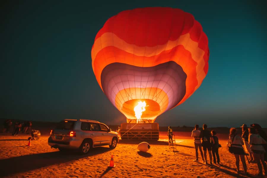 Dubai: Hot Air Balloon Ride with Camel Ride & Falcon Show - From your hotel to Margham Desert: how the morning actually runs